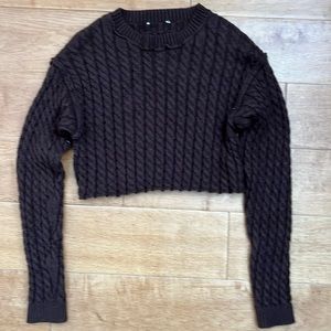 A brown small cropped long sleeve shirt